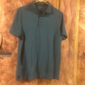 Medium sized blue champion polo shirt